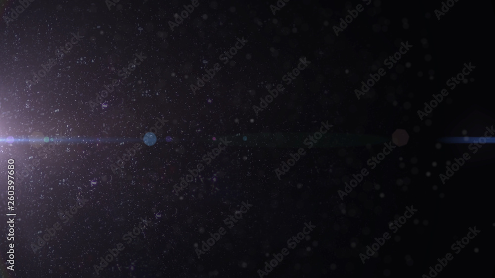 Obraz premium Real Lens Flare Shot in Studio over Black Background. Easy to add as Overlay or Screen Filter over Photos.