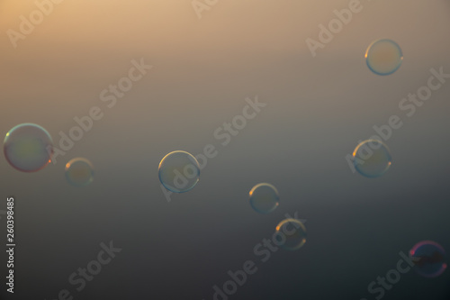 Sunrise behind Soap bubble photo