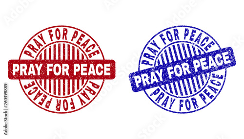 Grunge PRAY FOR PEACE round stamp seals isolated on a white background. Round seals with grunge texture in red and blue colors.