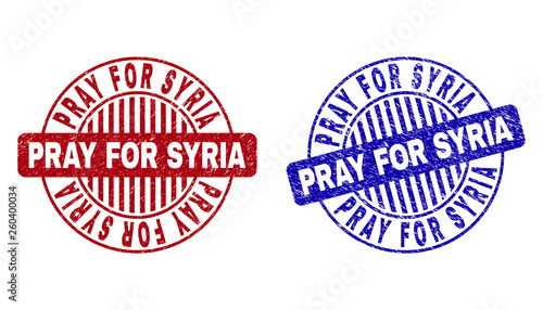 Grunge PRAY FOR SYRIA round stamp seals isolated on a white background. Round seals with grunge texture in red and blue colors.