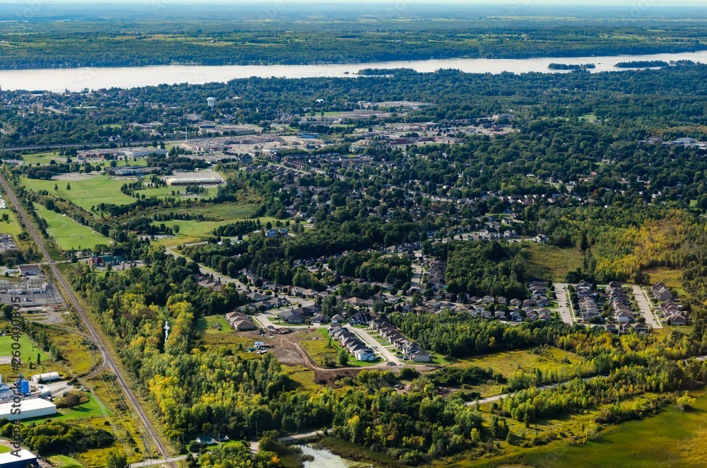 Aerial view of Brockville, Ontario bordered by train tracks and the St. Lawrence River