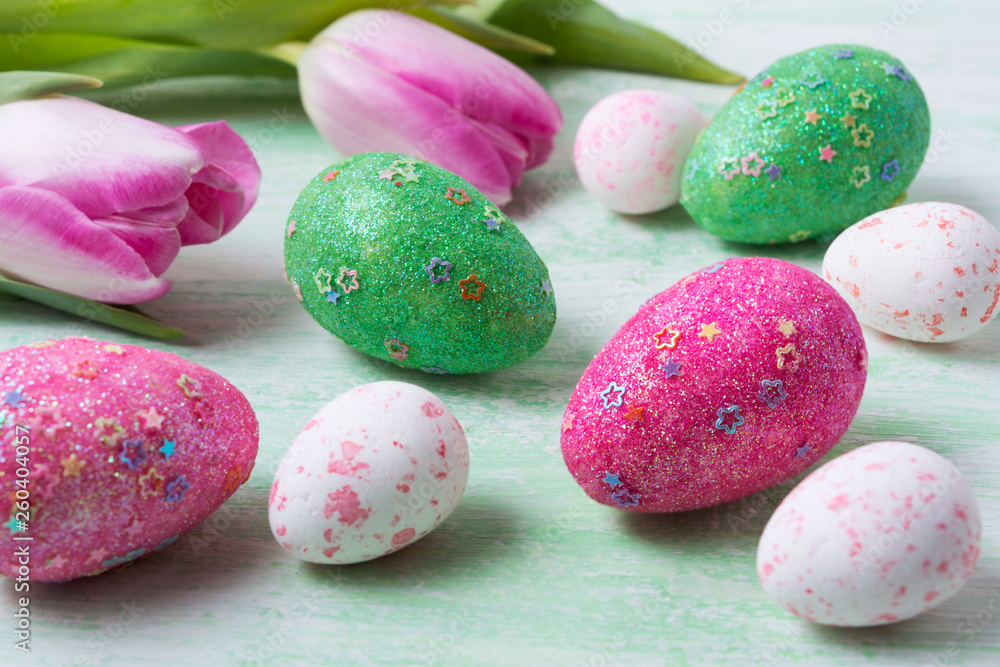 Easter background with white, green, pink eggs
