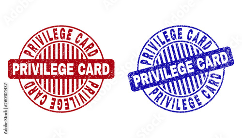 Grunge PRIVILEGE CARD round stamp seals isolated on a white background. Round seals with grunge texture in red and blue colors.