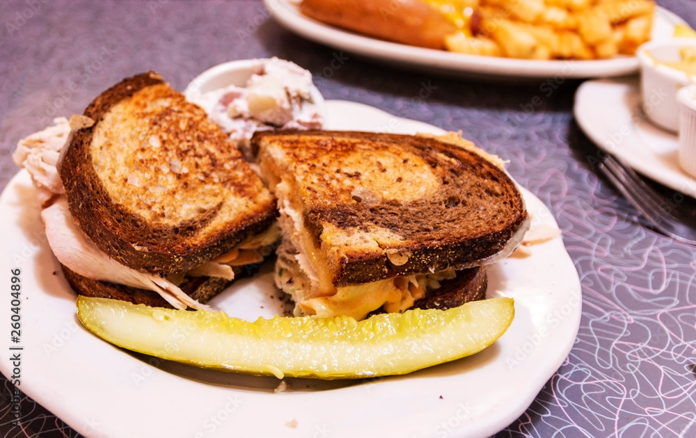 Grilled turkey on rye sandwich with a pidkle Grilled turkey on rye sandwich with a pidkle