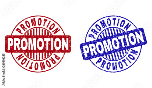 Grunge PROMOTION round stamp seals isolated on a white background. Round seals with grunge texture in red and blue colors. Vector rubber imprint of PROMOTION caption inside circle form with stripes.