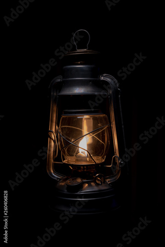 Old antique Lantern In darkness . Light concept image.