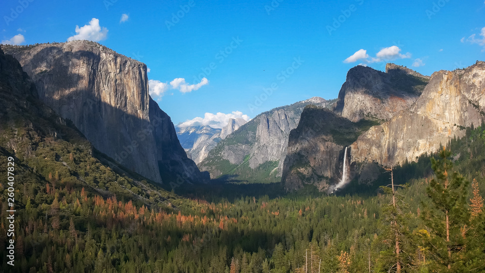 afternoon view of bridalveil falls and half dome in yosemite national park