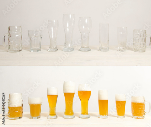Eight empty and eight full glasses of beer 