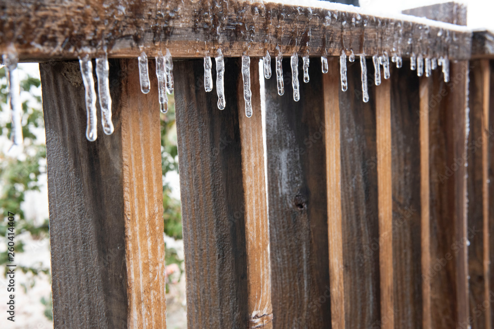 Fototapeta premium Ice on wood railing