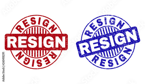 Grunge RESIGN round stamp seals isolated on a white background. Round seals with grunge texture in red and blue colors. Vector rubber imprint of RESIGN title inside circle form with stripes.