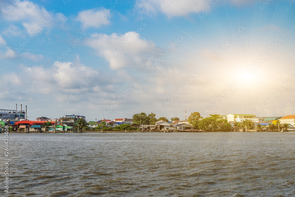 Fototapeta premium Tropical lake with local house