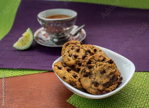 tea cup with chocolate chip cookies