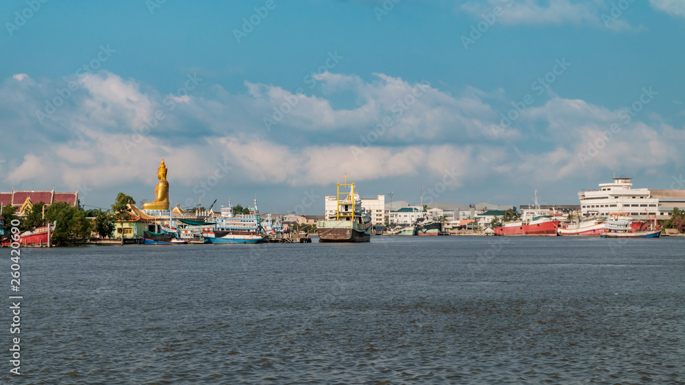 Many boats moored alongside the home, Fishing boats with blue sky