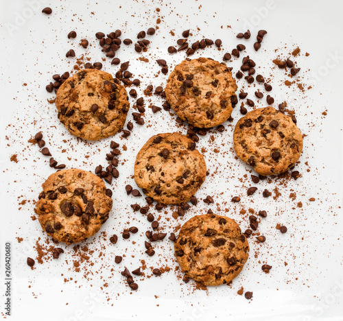 Aerial shot of chocolate chip cookies on white background