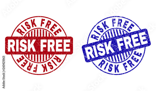 Grunge RISK FREE round stamp seals isolated on a white background. Round seals with grunge texture in red and blue colors. Vector rubber watermark of RISK FREE caption inside circle form with stripes.