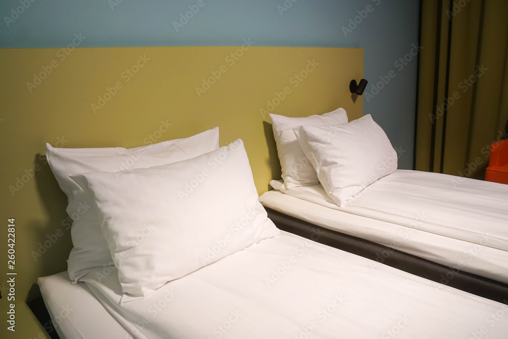 white mattress and comfortable pillows in hotel twin bedroom white mattress and comfortable pillows in hotel twin bedroom