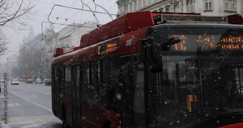 Street scene and city traffic with red double decker touristic bus on Budapest