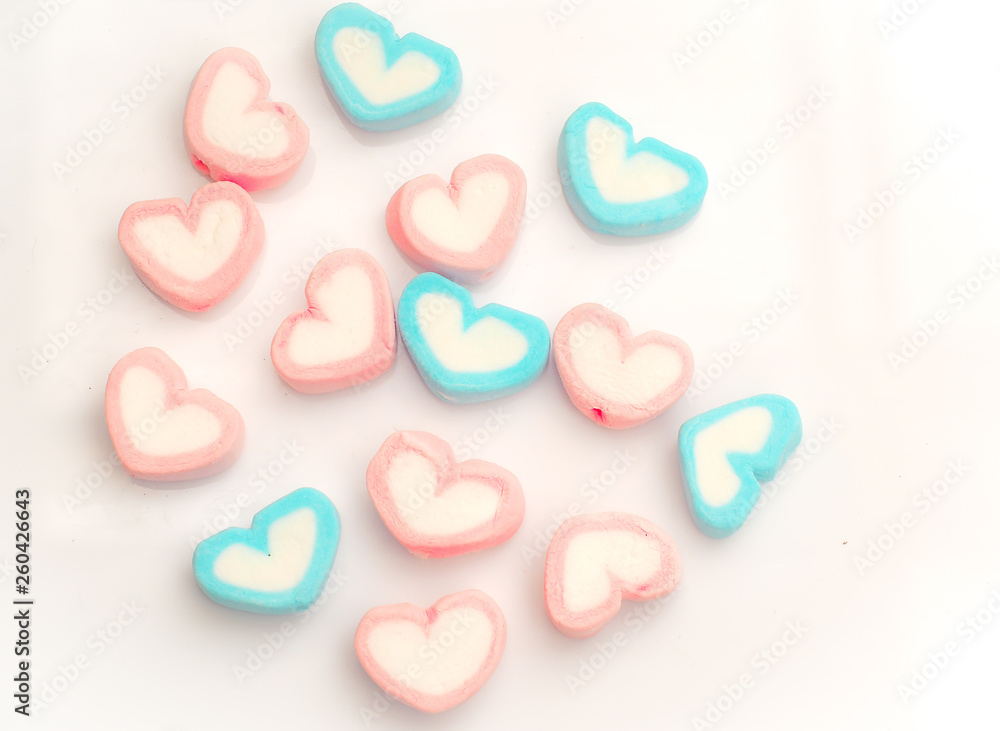 Naklejka premium Colorful candies marshmallow heart shape isolate white background