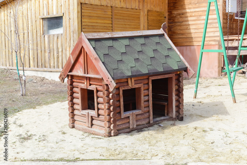 Quadro su tela Tiny rural wooden bar-shaped house, dog doghouse