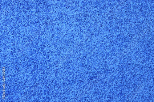 Blue beach towel texture. Blue beach towel background. Top view.