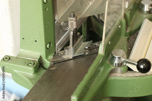 the guillotine for the production of frames for paintings, photographs