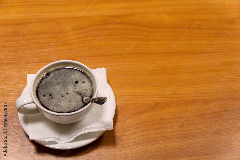 Obraz premium Cup of coffee on a saucer