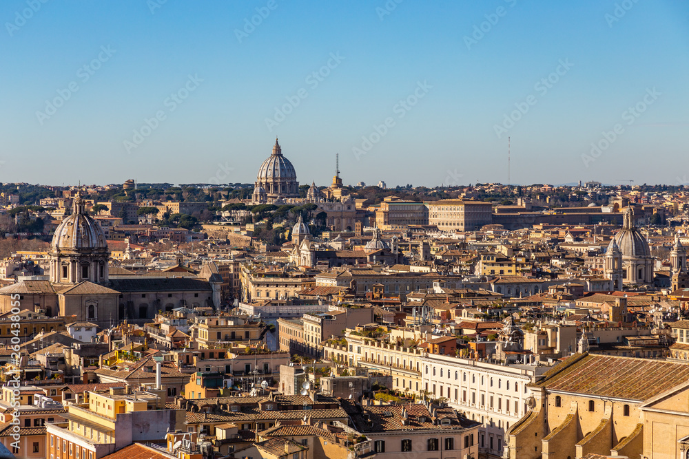 Panoramic sight from the heights with the dome and rooftops of the eternal city in Rome, Italy