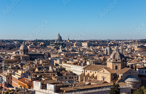 Panoramic sight from the heights with the dome and rooftops of the eternal city in Rome, Italy © Alex