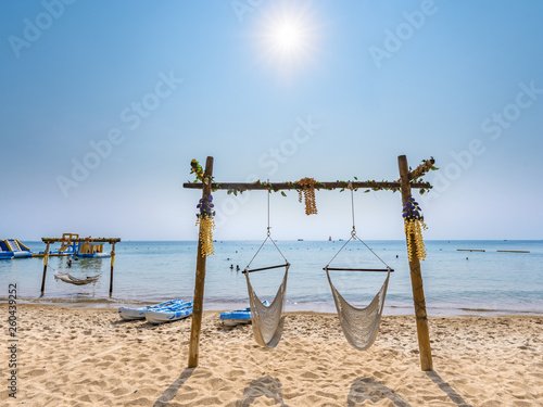 The elegant swings on the sea beach