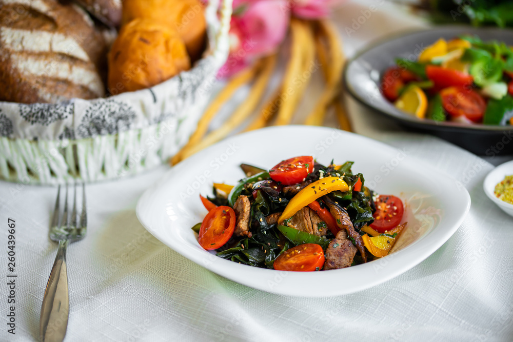 warm vegetable salad with meat. healthy food