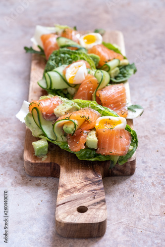 Lettuce wrapped smoked salmon tacos with fresh cucumber, avocado and eggs