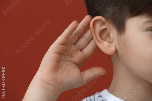 Little boy with hearing pro...
