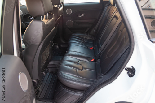 View to the interior of car with opened rear door and seats after cleaning before sale on parking © Aleksandr Kondratov
