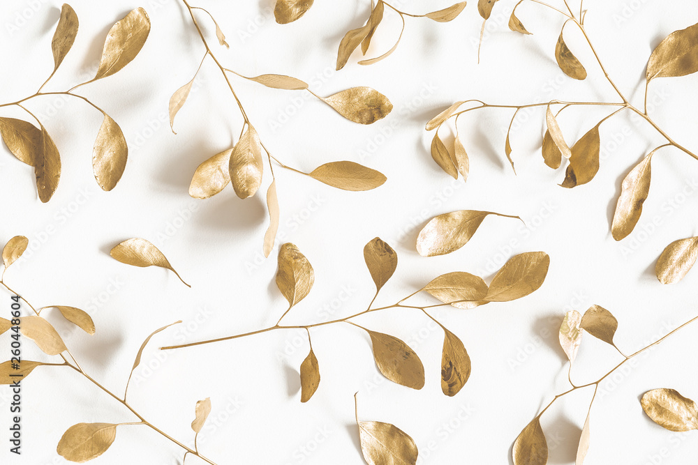 Eucalyptus leaves on white background. Pattern made of golden eucalyptus branches. Flat lay, top view - obrazy, fototapety, plakaty 