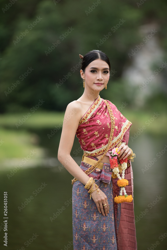 thai model in thai dress and jewellery in the garden 