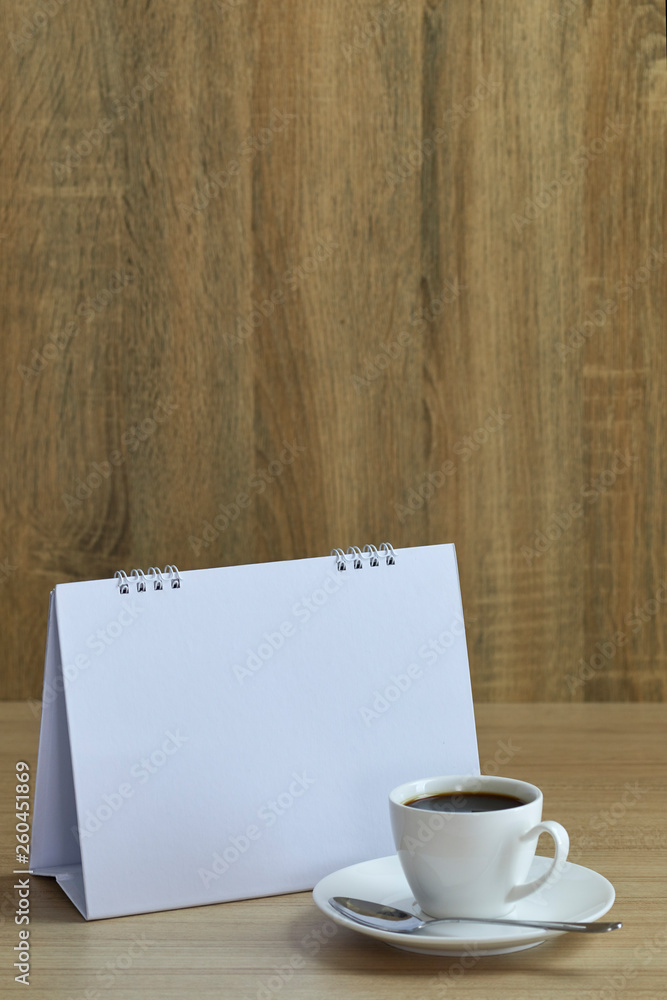Holiday concept coffee and empty calendar Holiday concept coffee and empty calendar