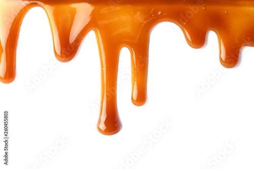 Tableau sur toile Stains of liquid caramel on white background