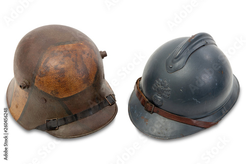 world war one french and german helmets on the white background