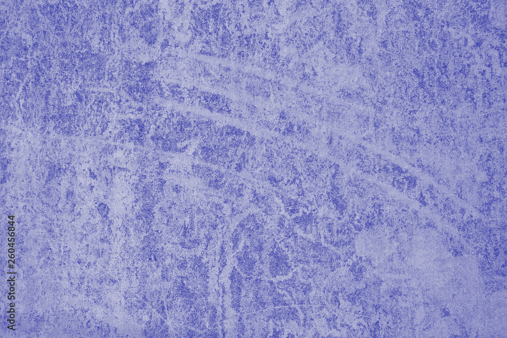 Naklejka premium Abstract texture of concrete wall. Blue toned. Close-up. Selective focus. Copy space.
