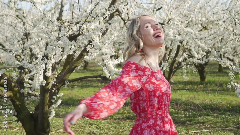 Spring, blooming apple trees, young happy woman. Spring, blooming apple trees, young happy woman.