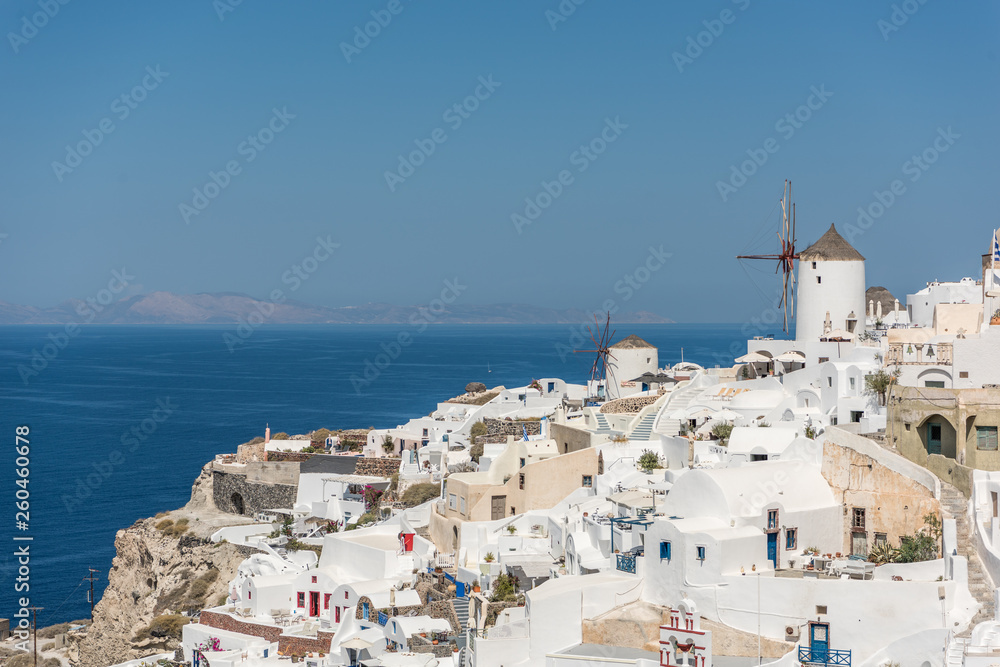 Fototapeta premium View at windmill in Oia
