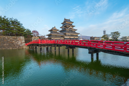 Matsumoto Castle with the red bridge in Nagano, Japan