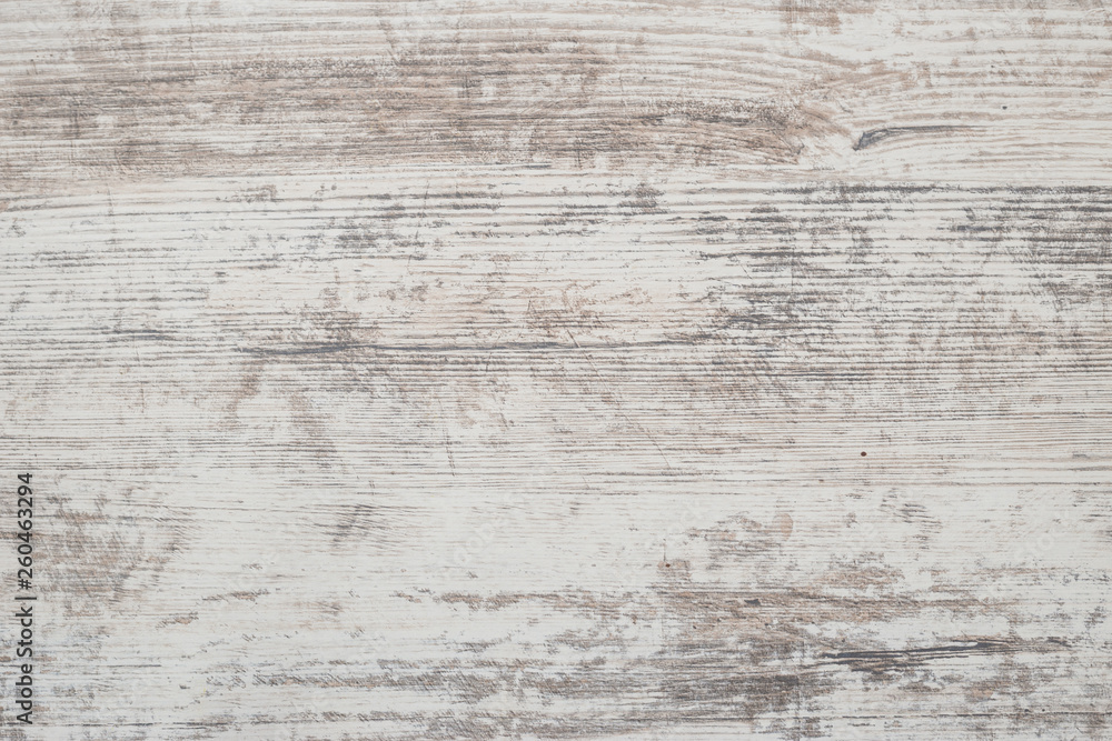 Naklejka premium Grunge background. Peeling paint on an old wooden floor.