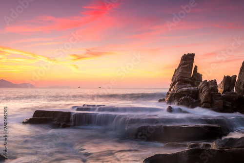 beautiful sunset at rocky beach