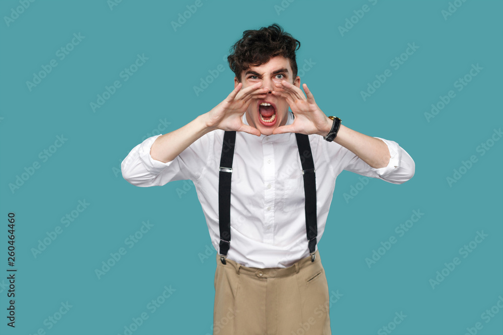 Angry man screaming and looking at camera. Angry man screaming and looking at camera.