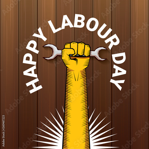 Happy labour day vector label with strong orange fist on wooden background. vector happy labor day background or banner with man hand. workers may day poster