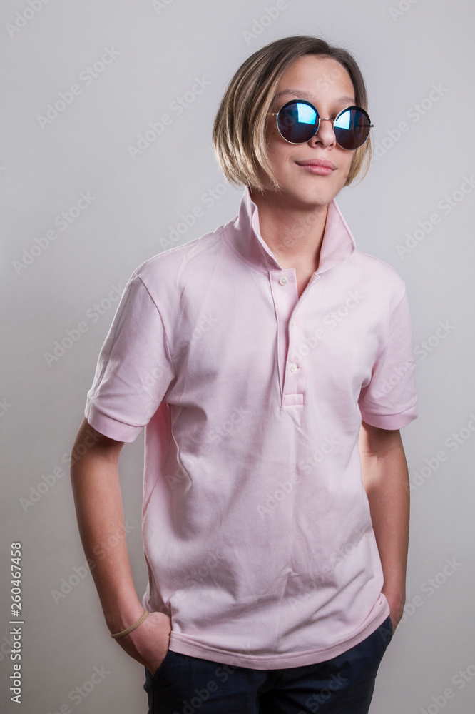 stylish teen posing in sunglasses stylish teen posing in sunglasses