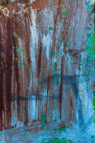 cracked paint on metal surface