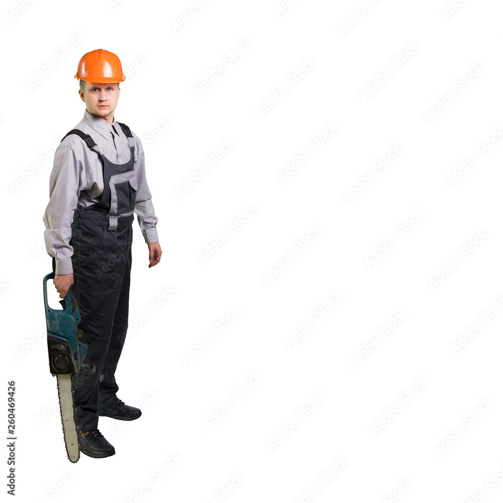 A serious looking construction man is looking at you. He is ready or has done all the work. Work engineer for repair, construction or other woodwork. saw. Isolated A serious looking construction man is looking at you. He is ready or has done all the work. Work engineer for repair, construction or other woodwork. saw. Isolated