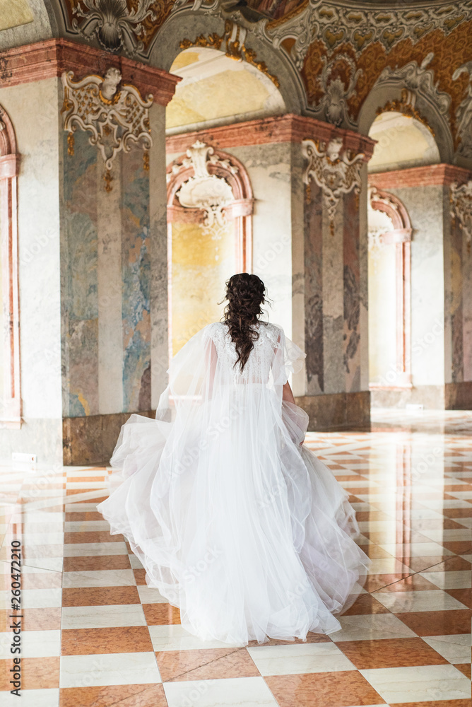 Fototapeta premium Beautiful bride in luxury baroque interior.